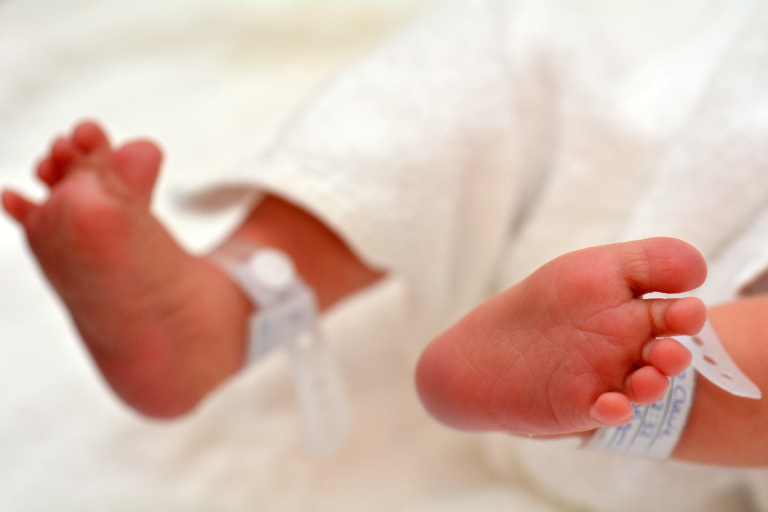Feet of a newborn infant in NICU